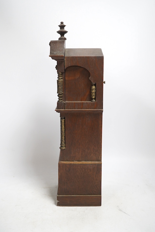 A miniature longcase clock and a miniature yew cylinder musical box, largest 42cm high. Condition - box poor, clock good